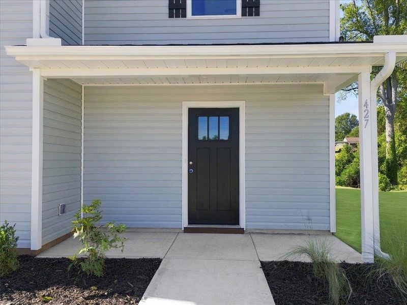 Exterior details and patio area of a home in Stones Throw, Inman (Image 3).