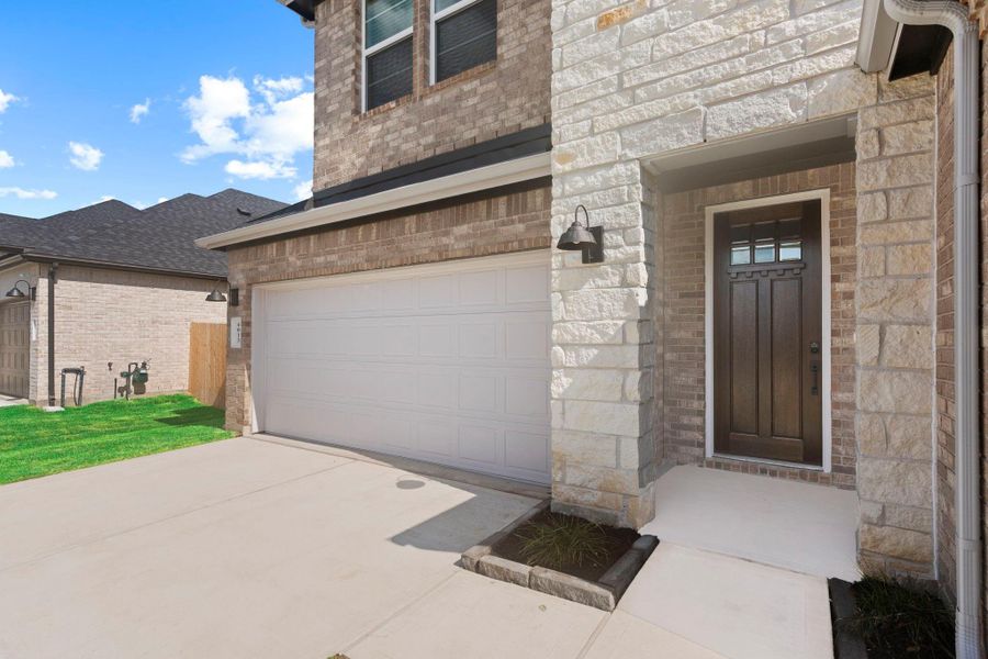 Exterior details and patio area of a home in Westland Ranch 50' Homesites, League City (Image 3).
