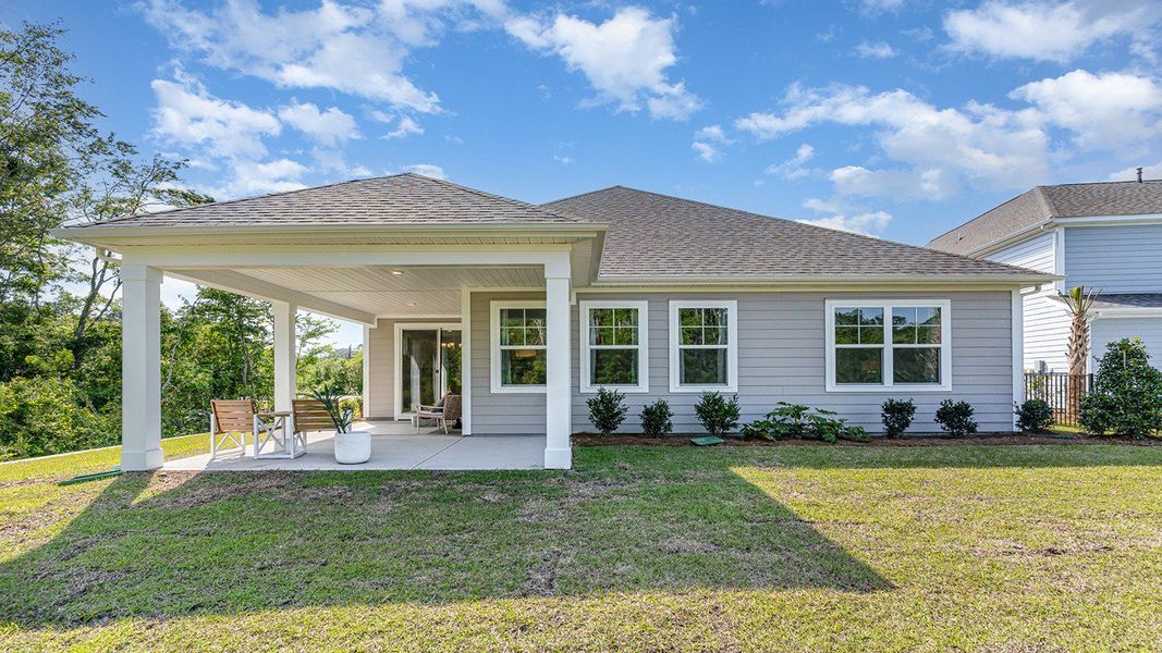 Representative exterior photo of a completed home built from the DARBY by D.R. Horton in The Retreat at Wild Wing, Conway, SC (Image 23).