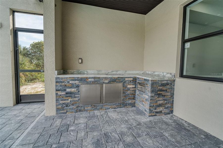 Exterior details and patio area of a home in , Port Charlotte (Image 33).