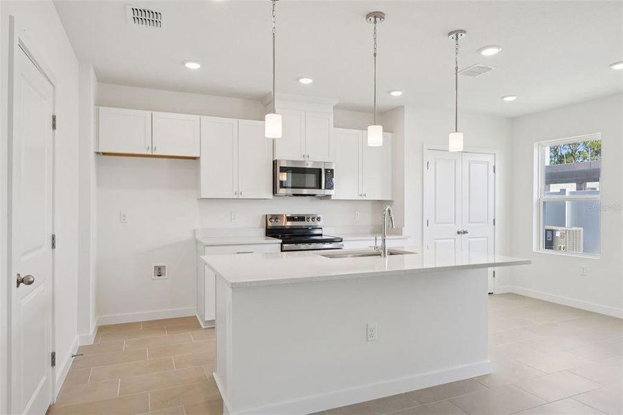 Furnished interior view inside a new home in Cyrene at Harmony, St. Cloud (Image 6).