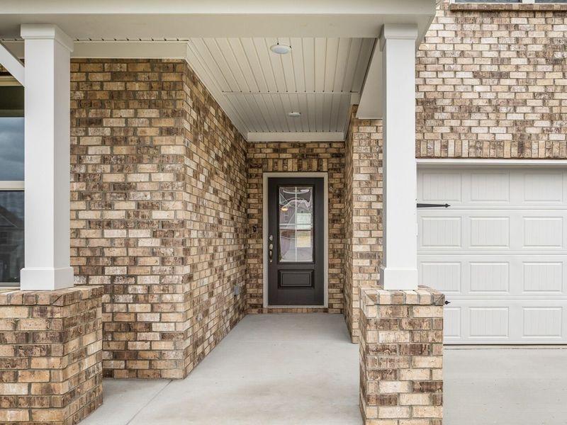 Exterior details and patio area of a home in Woods Crossing, Gallatin (Image 3).