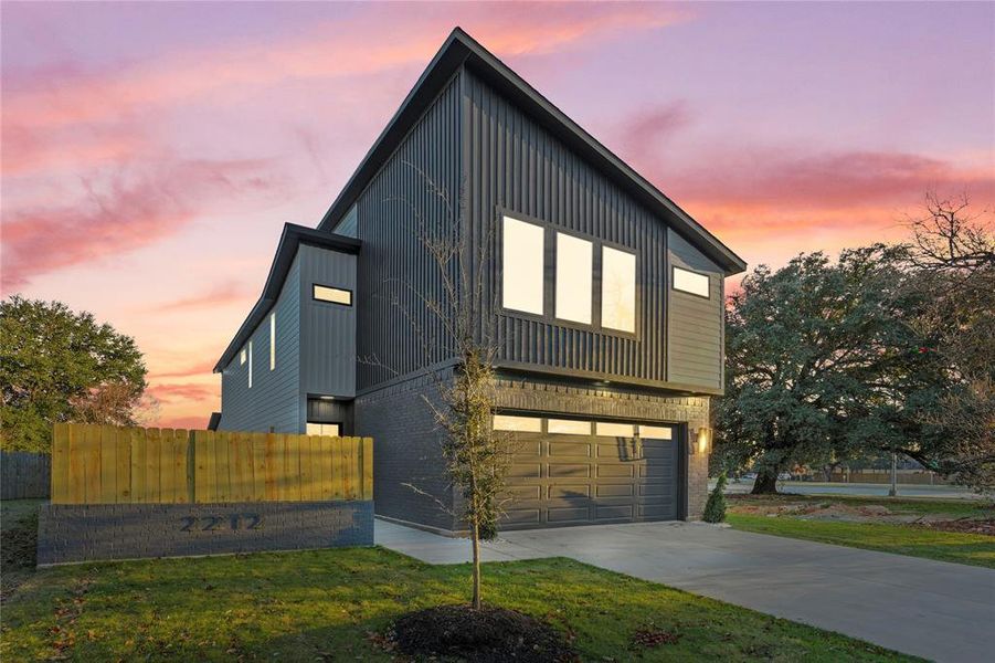 Front exterior of a new home in , Dallas, TX, highlighting curb appeal (Image 23).