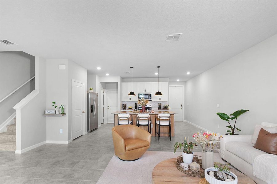 View back to Kitchen and Front Door