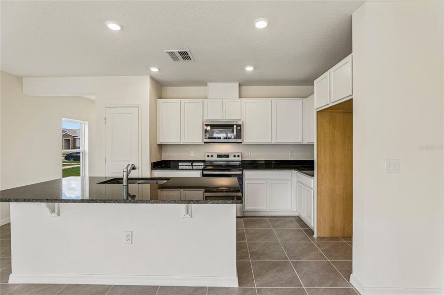 Furnished interior view inside a new home in , Lake Wales (Image 6).