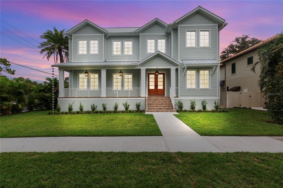 Front exterior of a new home in , Tampa, FL, highlighting curb appeal (Image 27). Front exterior of a new home in , Tampa, FL, highlighting curb appeal (Image 27).