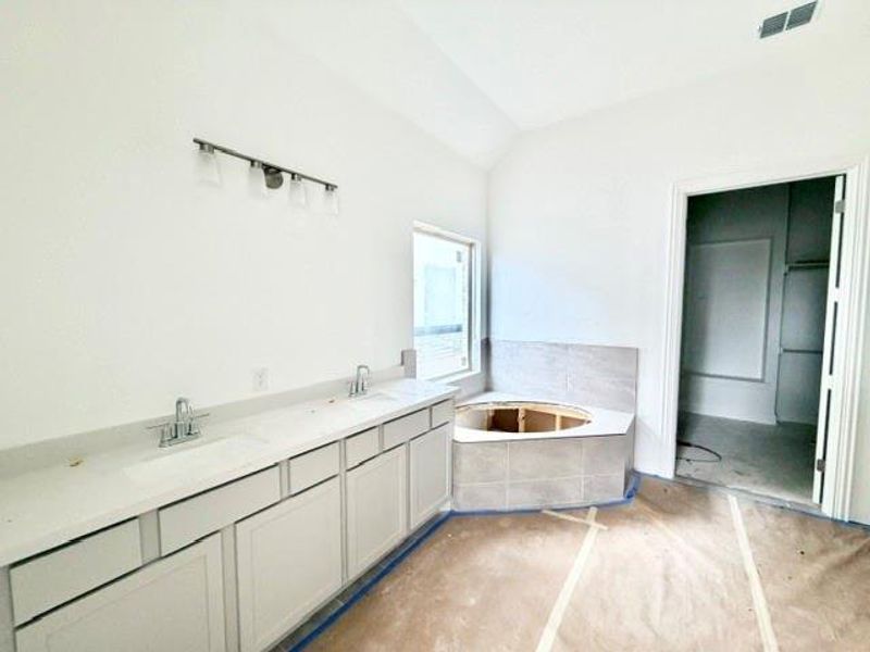 In-progress construction of a new home in Hawkes Landing, Leander, TX (Image 10).