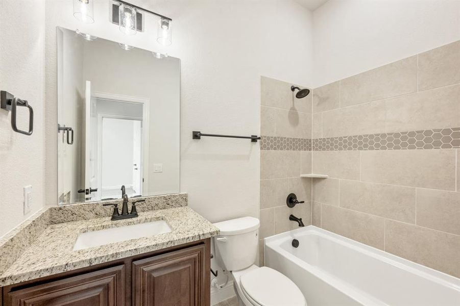 Furnished interior view inside a new home in Abe's Landing, Granbury (Image 14).
