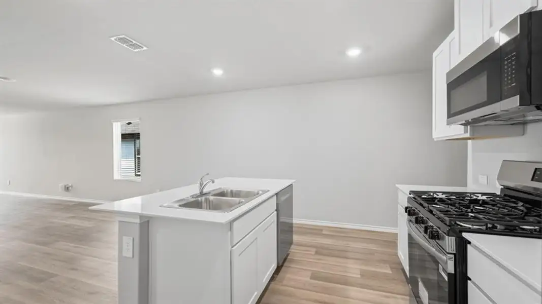 Furnished interior view inside a new home in Sunnycreek, Crowley (Image 11).