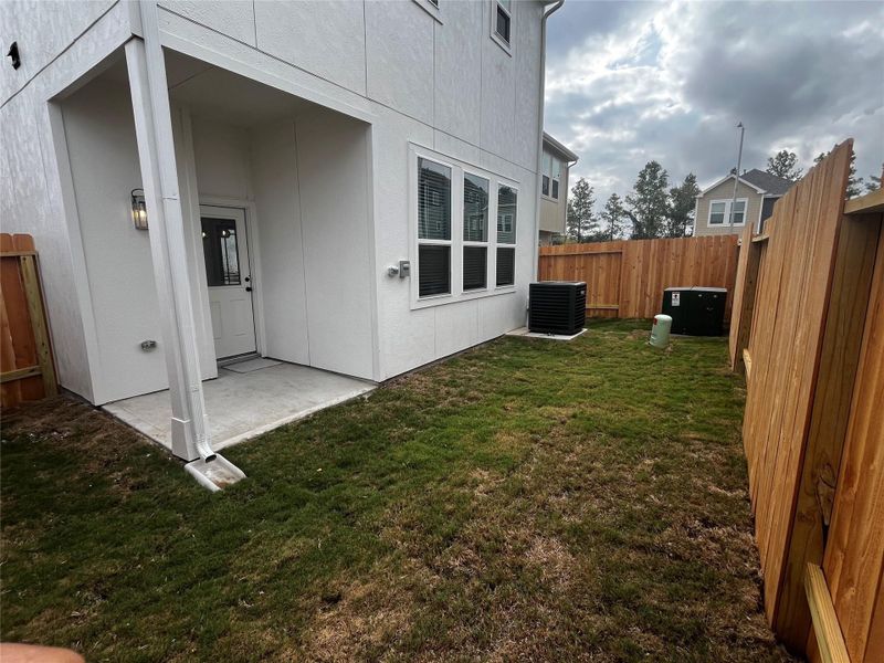 Backyard with covered patio Backyard with covered patio