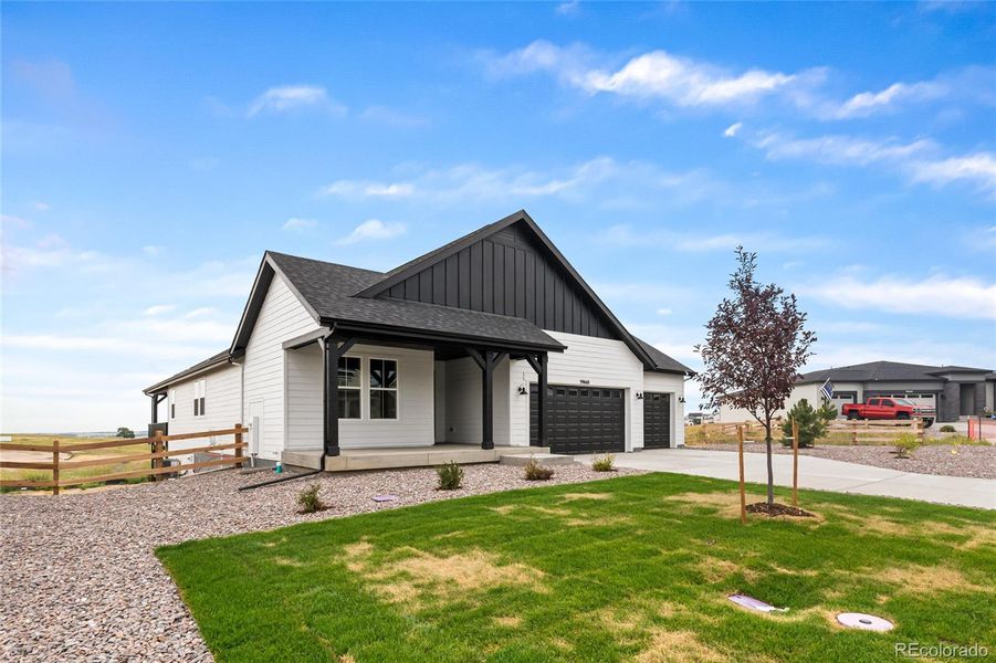 Front exterior of a new home in Independence, Elizabeth, CO, highlighting curb appeal (Image 25). Front exterior of a new home in Independence, Elizabeth, CO, highlighting curb appeal (Image 25).