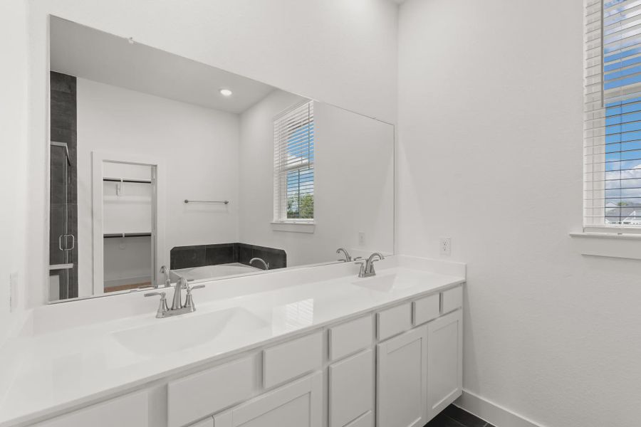 Representative furnished interior of a home built from the Cheverny by Chesmar Homes in Sienna Chateau, Missouri City (Image 10).