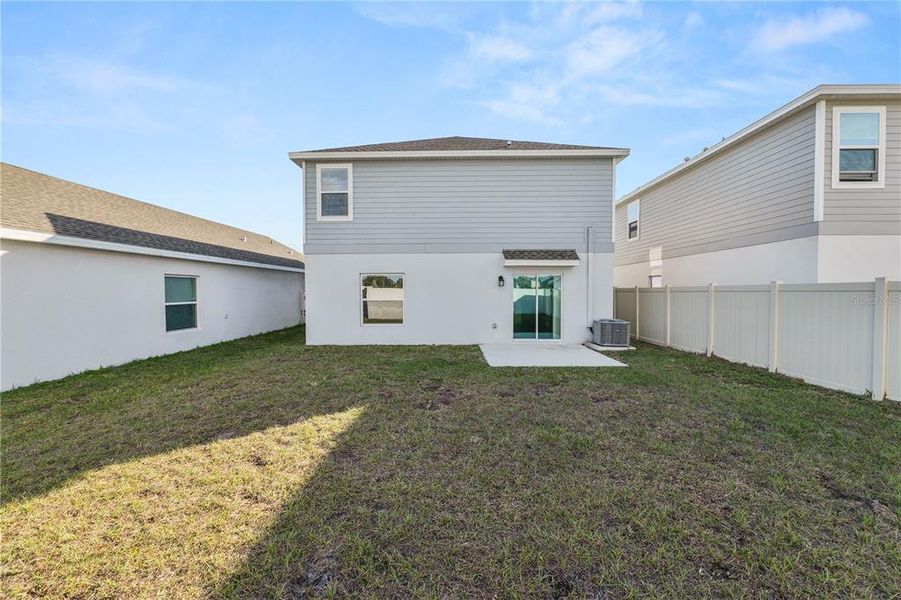 Exterior details and patio area of a home in Ranches at Lake McLeod, Eagle Lake (Image 4).