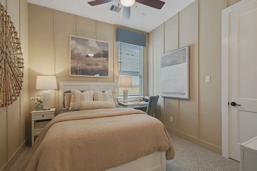 Representative furnished interior of a home built from the Hampton by Chesmar Homes in Lakes of Cane Island, Katy (Image 15).