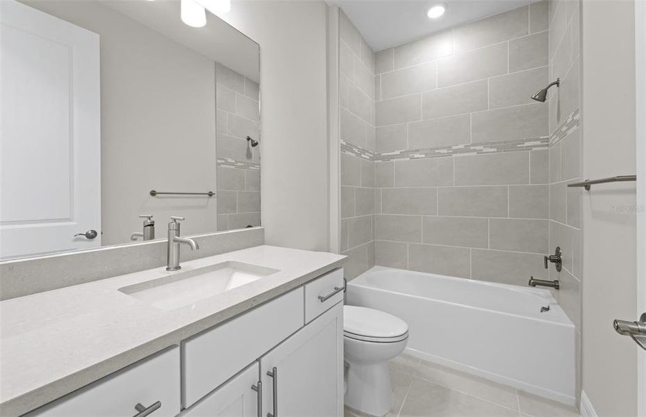 Furnished interior view inside a new home in Cedar Grove at The Woodlands, North Port (Image 7).