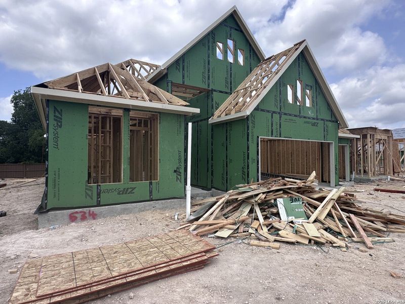 In-progress construction of a new home in Village at Three Oaks, Seguin, TX (Image 20).