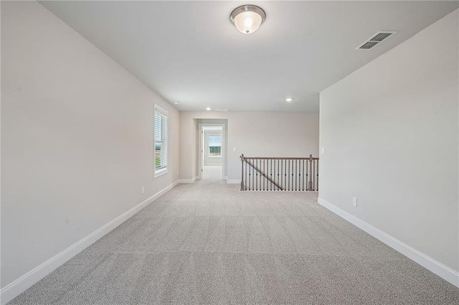 Spacious, unfurnished interior of a new home in River Pointe, Monroe (Image 40).