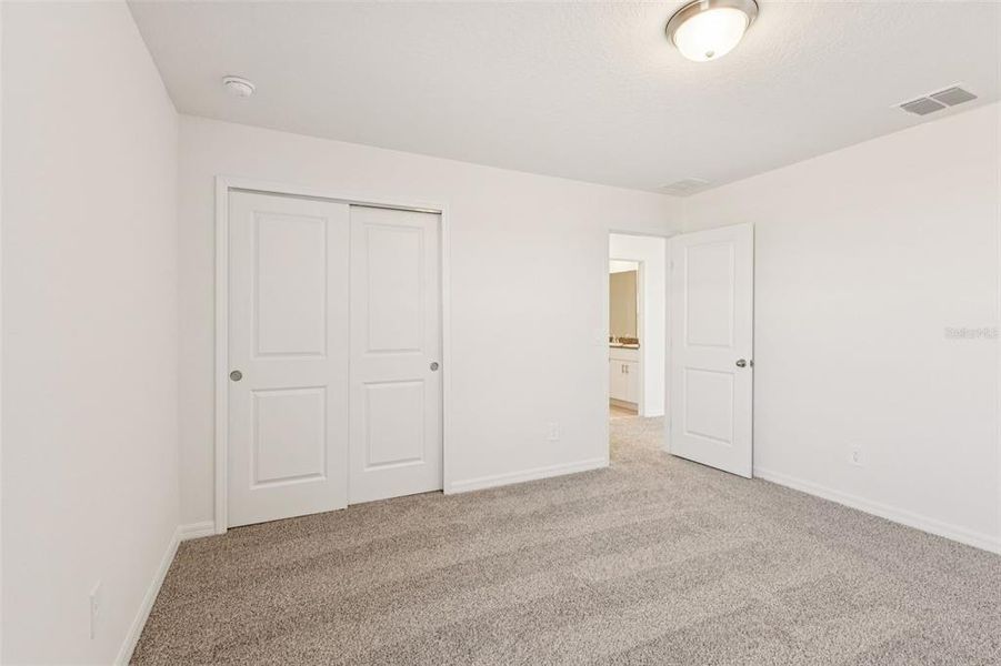 Spacious, unfurnished interior of a new home in The Reserve at Hammock Oaks - Classic Series, Lady Lake (Image 21).