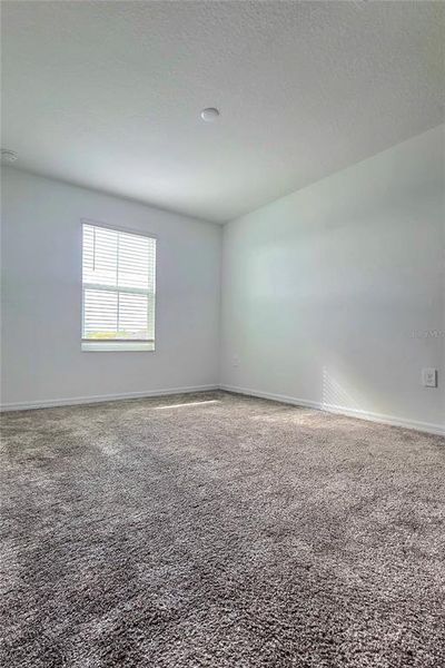 Spacious, unfurnished interior of a new home in Peace Creek Reserve, Winter Haven (Image 10).