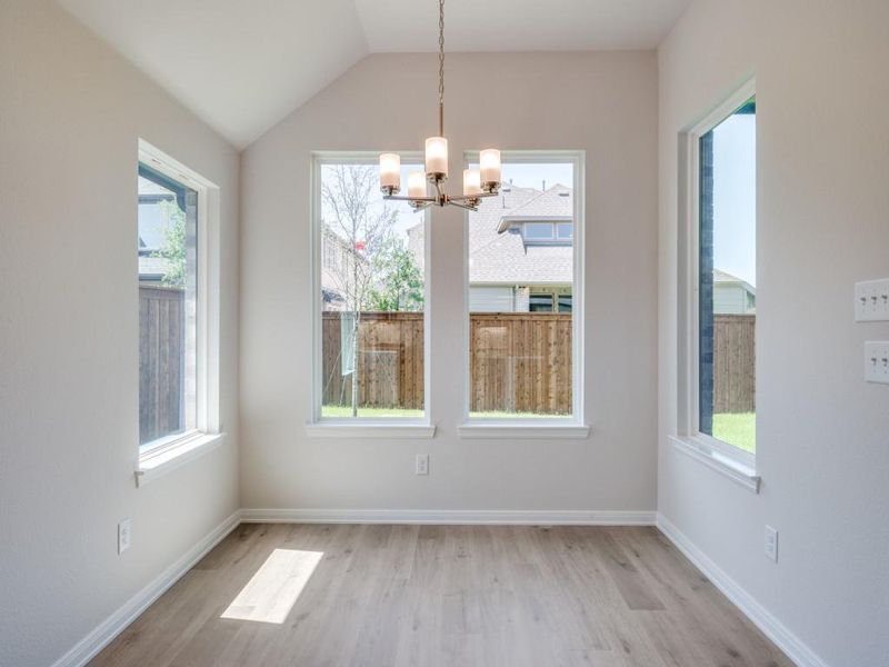 With windows everywhere you look, this lovely dining room is prefect for any occasion!