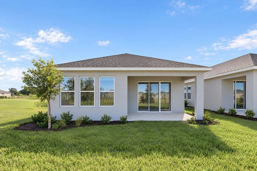 Exterior details and patio area of a home in Lochside, Mount Dora (Image 31).