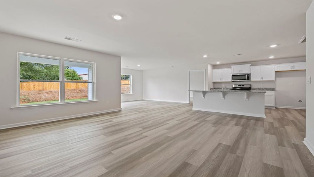 Spacious, unfurnished interior of a new home in Bentley Park, Greenwood (Image 22).