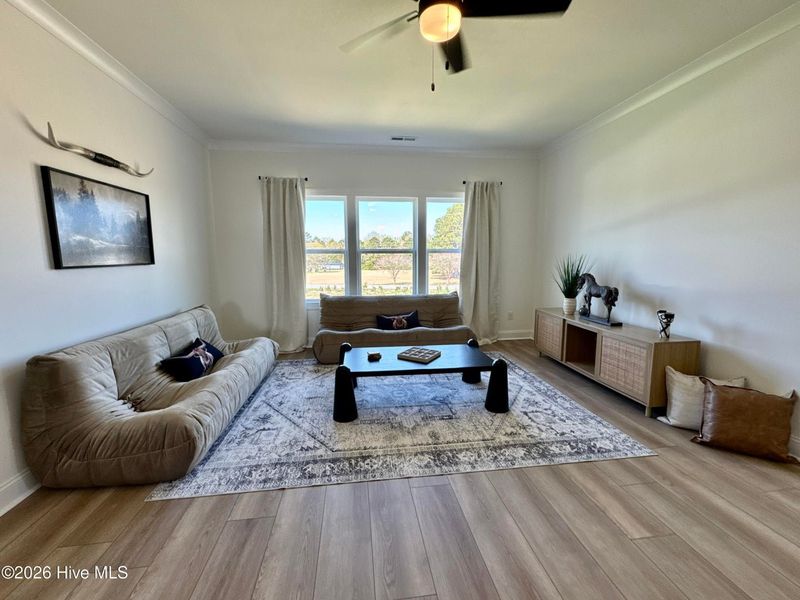Furnished interior view inside a new home in Dixon Grove, Grimesland (Image 9).