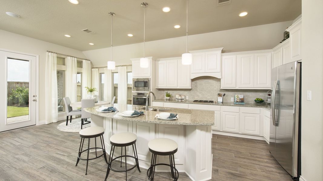 Representative furnished interior of a home built from the 2935W by Perry Homes in Meridiana, Rosharon (Image 22).