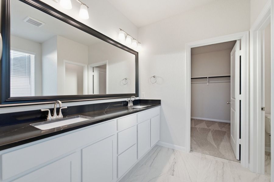 Furnished interior view inside a new home in The Woodlands at Medina Hills, Mico (Image 13).