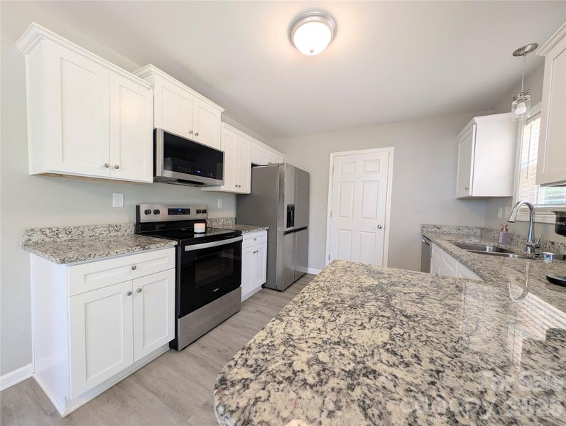 Furnished interior view inside a new home in , Clover (Image 28).