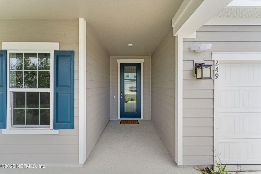 Exterior details and patio area of a home in Seminole Palms Single-Family Homes, Palm Coast (Image 26).