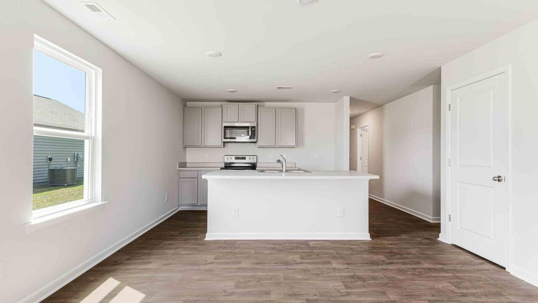 Image 21 representing the Devon by D.R. Horton in Eagle Creek, Bolivia, NC.