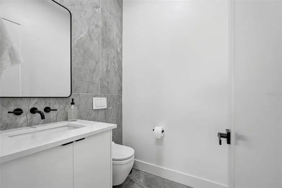 Furnished interior view inside a new home in , Port Charlotte (Image 50).