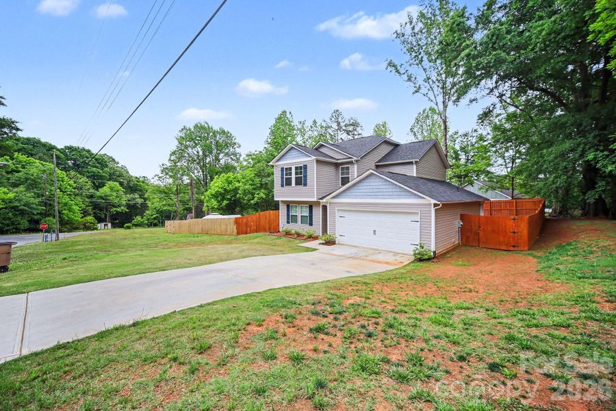 Front exterior of a new home in , Shelby, NC, highlighting curb appeal (Image 20).