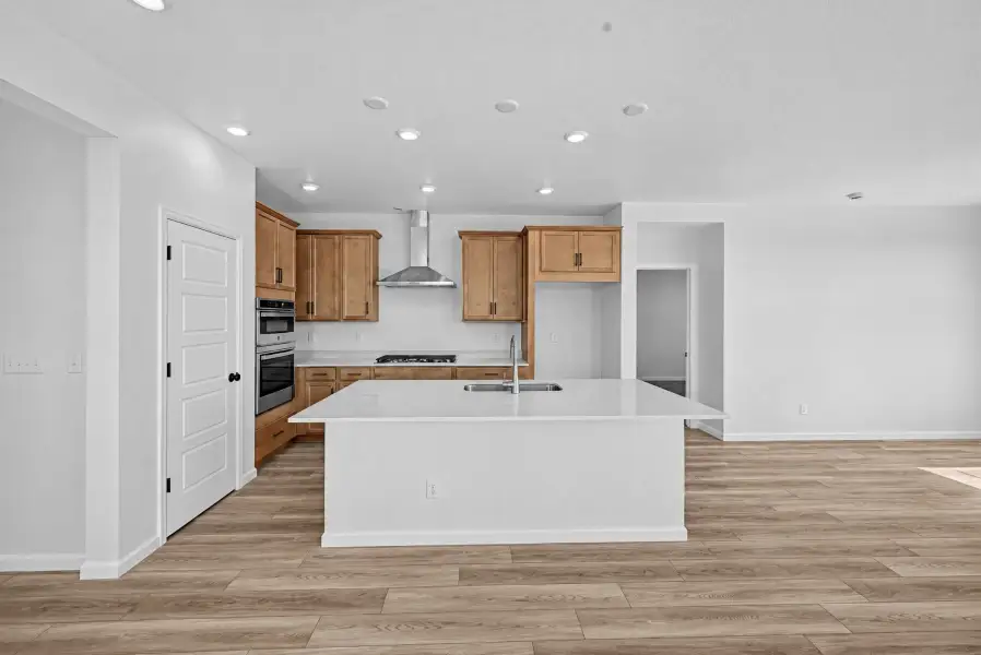 Furnished interior view inside a new home in The Aurora Highlands, Aurora (Image 3).