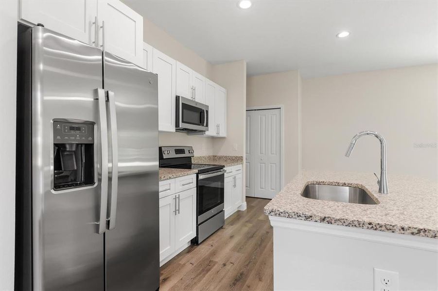 Furnished interior view inside a new home in , Port Charlotte (Image 9). Furnished interior view inside a new home in , Port Charlotte (Image 9).