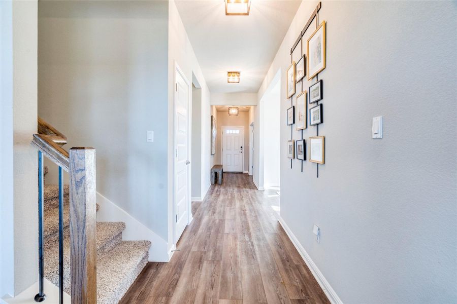 Entryway to office, dining, and second downstairs bedroom.