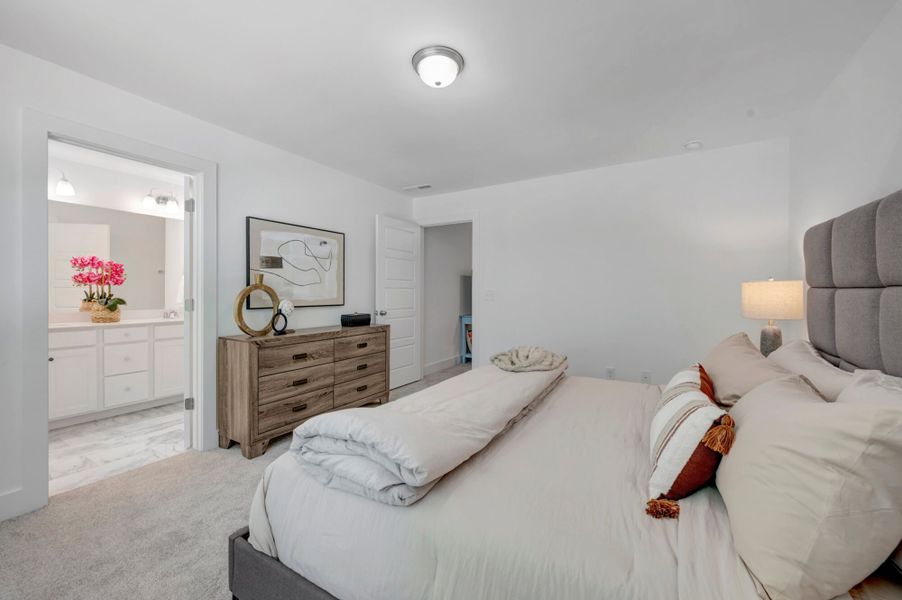 Furnished interior view inside a new home in Ashmore Townes, Garner (Image 16).