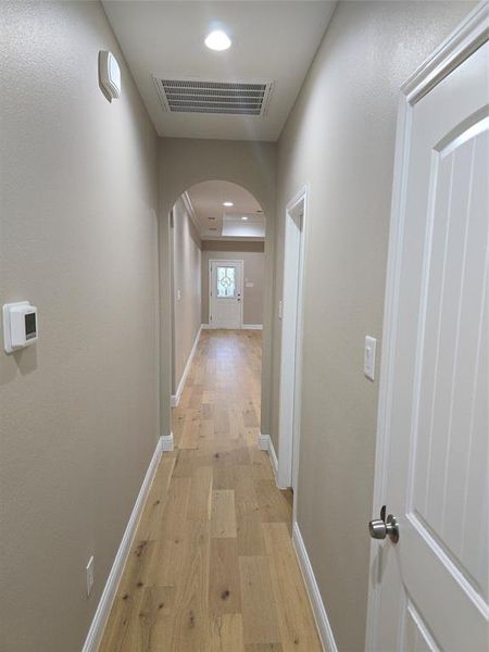 Hall with light wood-type flooring