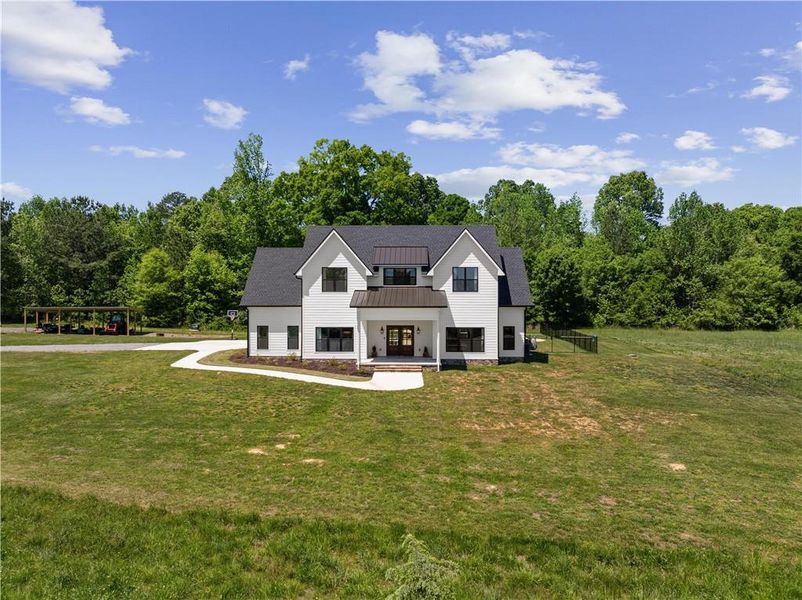 Front exterior of a new home in , Resaca, GA, highlighting curb appeal (Image 26).