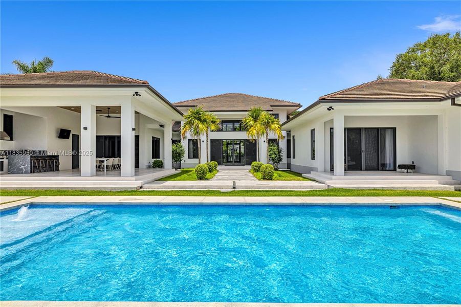 Front exterior of a new home in , Pinecrest, FL, highlighting curb appeal (Image 19).