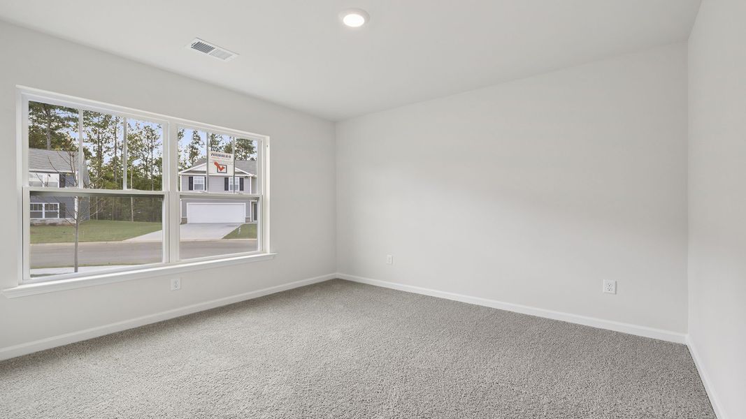 Spacious, unfurnished interior of a new home in Bentley Park, Greenwood (Image 13).