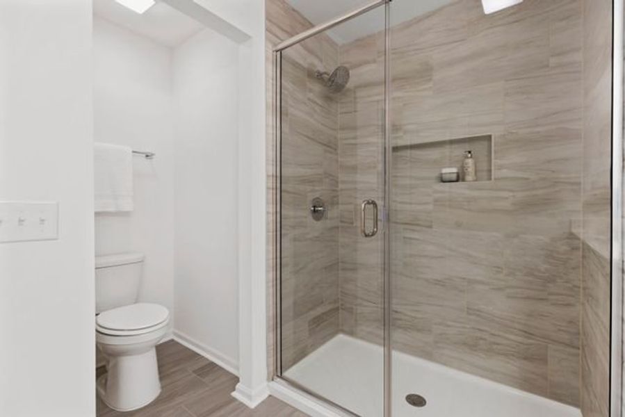 Representative furnished interior of a home built from the Alexandria TH by True Homes in Covington Ridge Townhomes, Thomasville (Image 16).