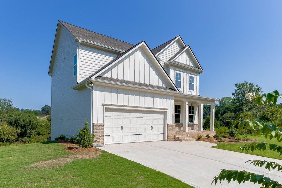 Front exterior of a new home in , Jefferson, GA, highlighting curb appeal (Image 23).