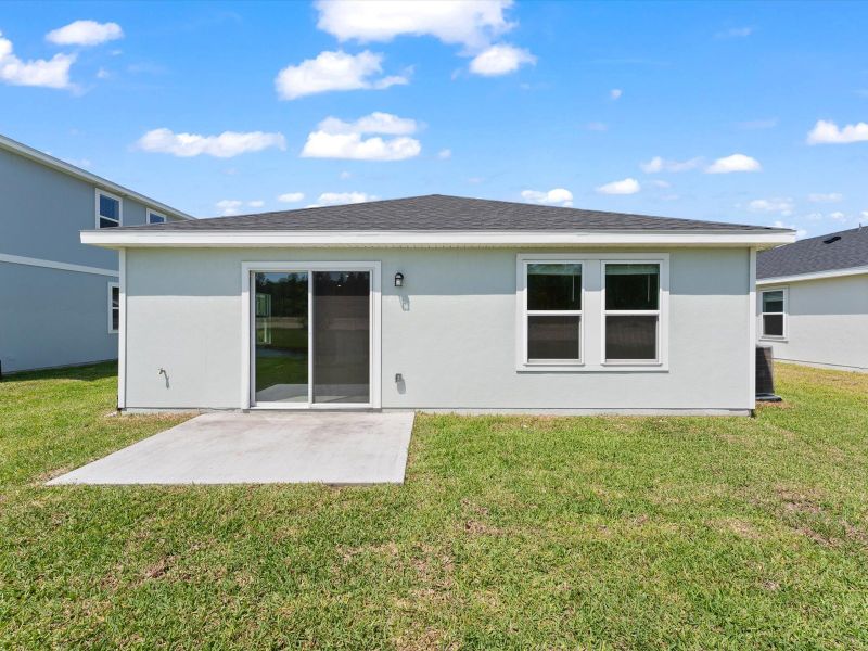 Exterior details and patio area of a home in Flagler Village - Classic Series, Palm Coast (Image 3).