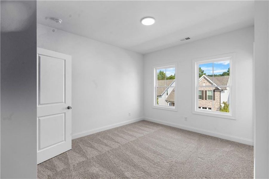 Spacious, unfurnished interior of a new home in Evanshire Townhomes, Duluth (Image 27). Spacious, unfurnished interior of a new home in Evanshire Townhomes, Duluth (Image 27).