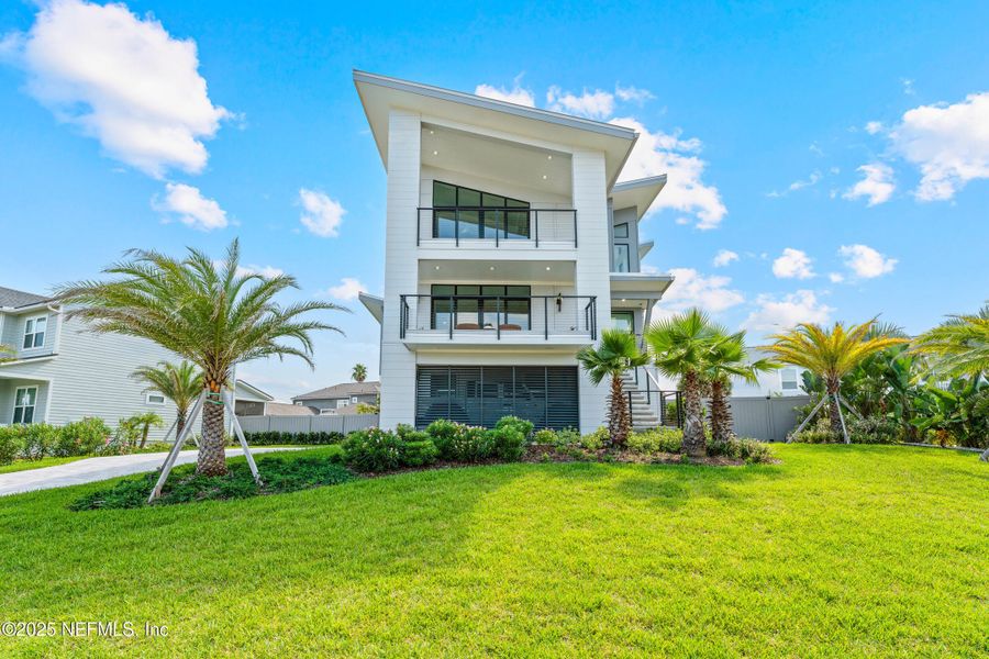 Front exterior of a new home in , Ponte Vedra Beach, FL, highlighting curb appeal (Image 24).