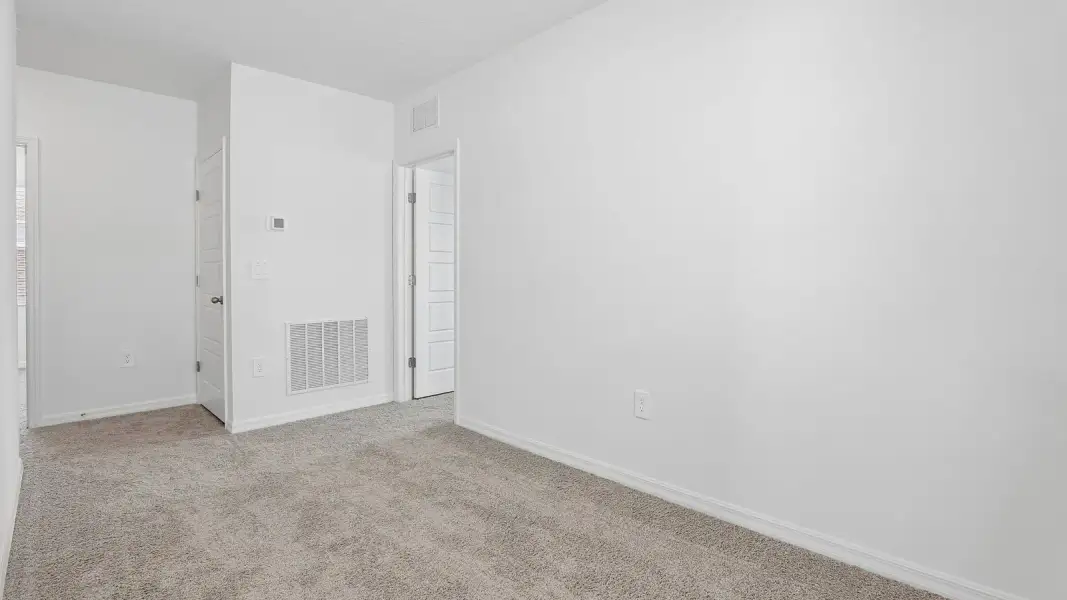 Representative unfurnished interior of a home built from the Crestview by D.R. Horton in Crosswinds, Haines City (Image 32).
