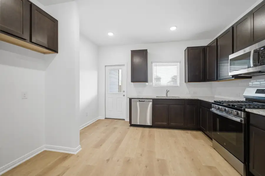 Furnished interior view inside a new home in Westridge, McKinney (Image 7).