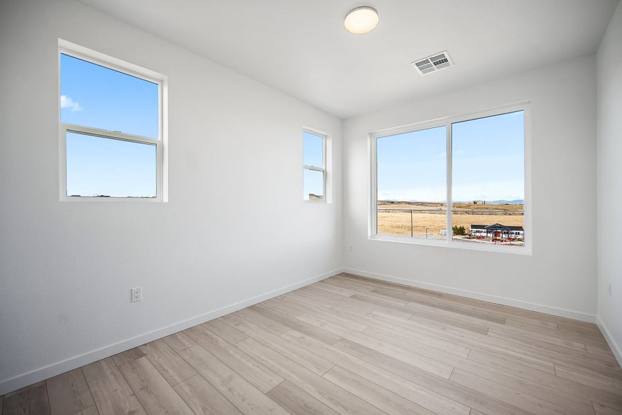 Spacious, unfurnished interior of a new home in Lyric at RidgeGate Condos, Lone Tree (Image 15).